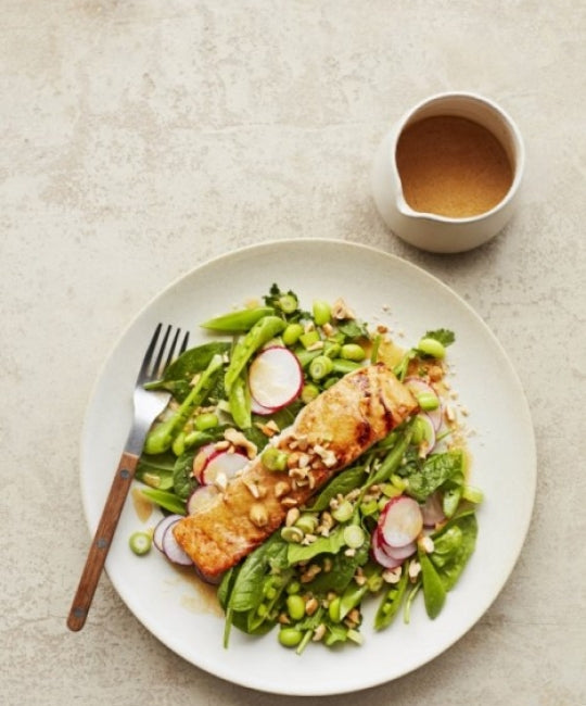 Spring Greens Salad with Seared Salmon in a Miso-Turmeric Vinaigrette